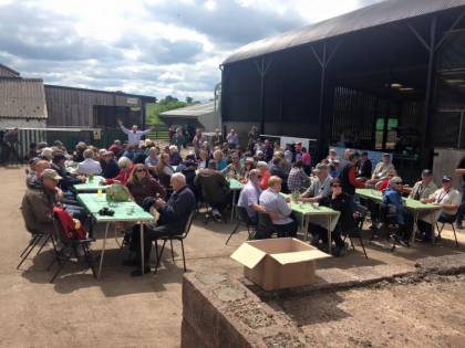 Enjoying lunch in the yard 'street party' style